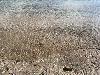 Clear clear water on the beach
