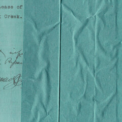 Colorful torn paper collage close-up. Texture made from various paper and cardboard parts. Damaged old paper background. Vintage blank wallpaper. Material design backdrop.