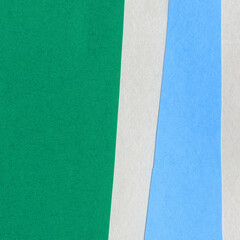 Fototapeta premium Colorful torn paper collage close-up. Texture made from various paper and cardboard parts. Damaged old paper background. Vintage blank wallpaper. Material design backdrop.