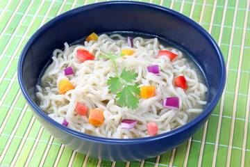 Pasta with vegetables in bowl