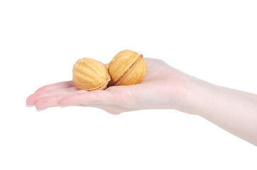 Nuts with condensed milk in hand on white background isolation