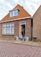 Man with toddler girl arriving at home