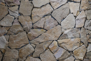 Natural stone wall. Design. Stone background. Copy space. 