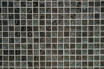 The surface of the glass and ceramic facing tiles. Squares. Copy space.