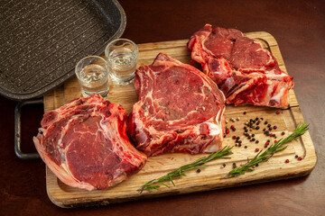 Fresh meat and vodka prepared to cook.