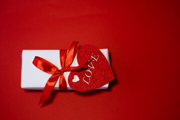 Banner. Velentines Day. Flat red heart, white handmade gift boxes on a red background. Copy space....