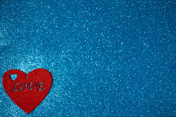 Banner. Velentin day, red heart on a blue background with sparkles. Place for the text. Holiday concept, congratulations