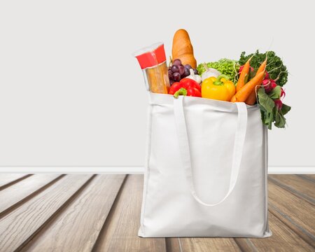 Shopping Fabric Bag With Groceries On Desk