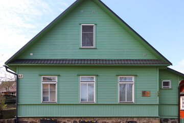 Colorful, typical wooden houses of Trakai, Lithuania. Exterior facade of old traditional village houses.
