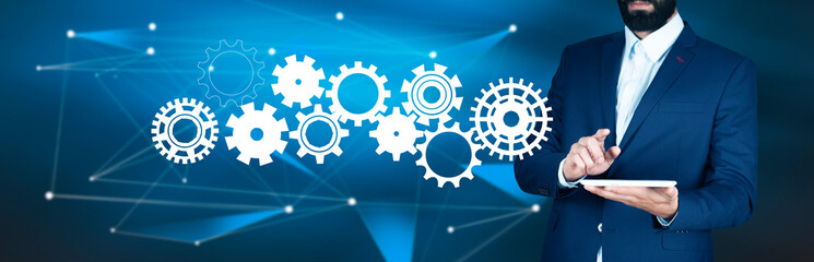 man holding gears in screen