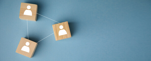 Wooden blocks connected on blue background