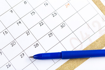 white calendar page for 2021 month schedule to make an appointment or manage the schedule every day with ballpoint pen for marks