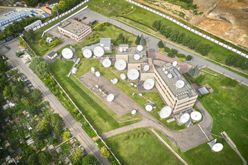 Buildings with satellite dishes aerial view