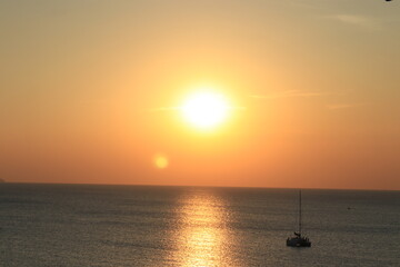 Sun Set by the sea , the golden beam  lays on the silky wave , very impressive scenery