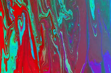Abstract blue-red marble background. The effect of natural stone. Acrylic paint flows freely and...