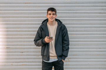 teenage boy with mobile phone