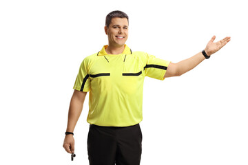 Soccer referee holding a whistle and pointing with hand