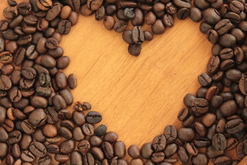coffee beans on a wooden background