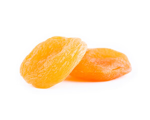 Two dried apricot isolated on a white background with clipping path
