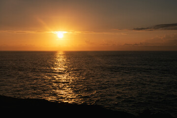 sunset over the sea in asia