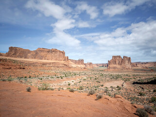 Dazzling Arches National Park in the summertime with sandstone formations on a partly cloudy day in Utah