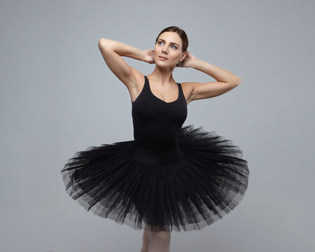 portrait of attractive ballerina. photo shoot in the studio on a white background