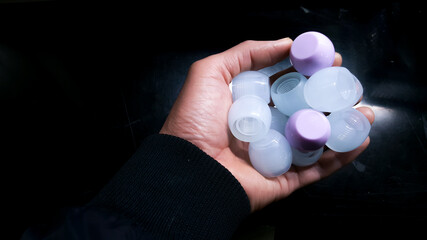 Round plastic parts, used as a cosmetic bottle cap. From the manufacturing department in a plastic factor