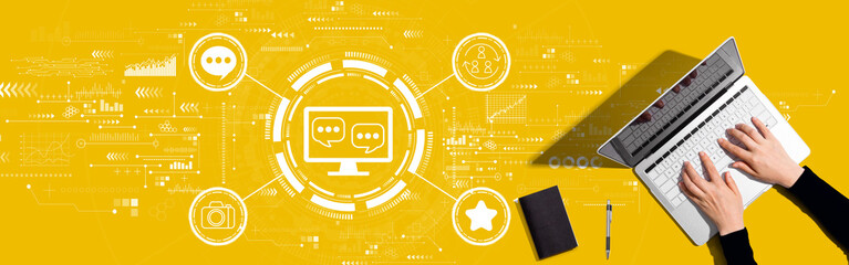 Social media theme with person working with a laptop