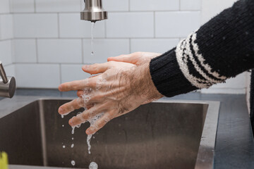 Proper hand washing technique using soap to kill viruses and bacteria for 30 seconds