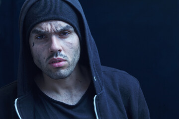 portrait of a young lonely man. Body language, gestures, body psychology concept.