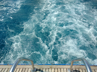 Trace tail of speed boat on water surface in the sea. Natural and vacation background. Beautiful