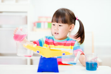 young girl play balance toy for homeschooling