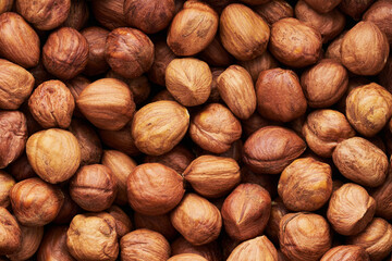 Hazelnut Background. Heap of peeled hazelnuts, food background
