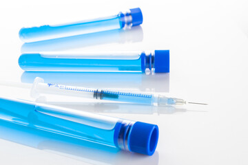 Virus cell. Medical syringe with needle for protection flu virus and coronavirus. Covid vaccine...