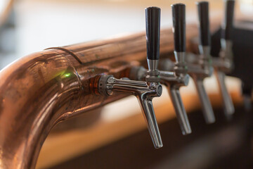 inactive taps for beer in German local in the time of the lockdown in brewery