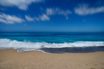 Fototapeta na wymiar Tropical sand beach and blue sky, hot summer day