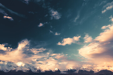 Mountain landscape with dramatic clouds in Xinjiang, China