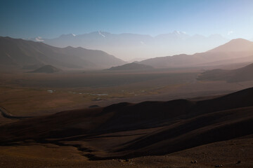 Fototapeta na wymiar Hazy mountain range in Xinjiang, China