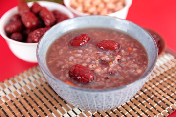 The traditional food of Chinese Laba Festival is Laba porridge and various kinds of dry fruit grains - obrazy, fototapety, plakaty