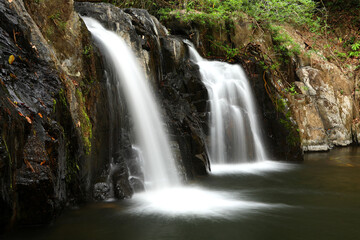 Fototapeta na wymiar Beautiful Ang Beng Waterfall in the rainy season at Chantaburi of Thailand