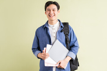 A photo of a handsome Asian student with a confident look