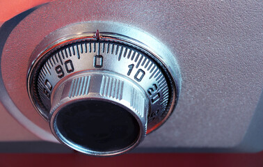 closeup of a safe and the combination dialer