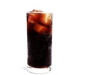 Close up view of the ice cubes in dark cola background. Texture of cooling drink with foam and macro bubbles on the glass wall.