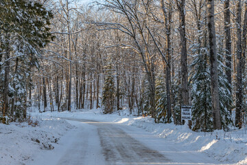 Caution Sign Large Trucks Hauling Curve in the roadway