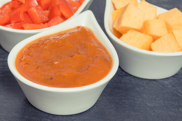 Homemade pumpkin sauce or ketchup with ingredients in bowls