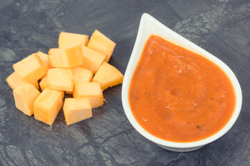 Pumpkin sauce or ketchup with ingredients in bowls