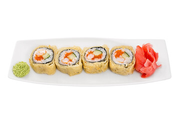 Japan baked sushi rolls on a white plate isolated on a white background. Restaurant serving concept.