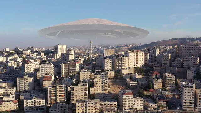Large Alien spaceship sacuer ufo over Muslim town, Aerial
, Aerial drone view with visual effect element, invasion sci fi concept, Palestine
