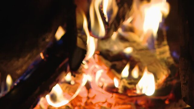 A warm fire in a chimney. Traditional wood fire oven inside hot
