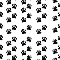 Fototapeta na wymiar Seamless pattern with the image of animal paws. Dog or cat paws of an animal. For textiles, wallpapers and backgrounds.